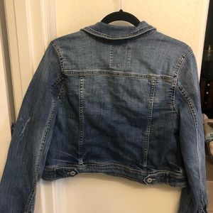 Distressed denim jacket